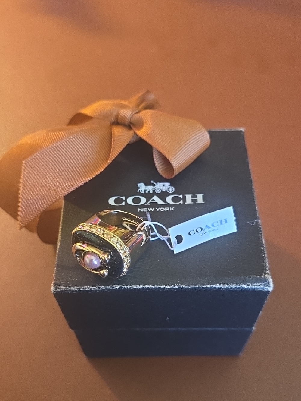 Coach Gold-Tone Varsity Ring with Pink Cabochon and Clear Crystals